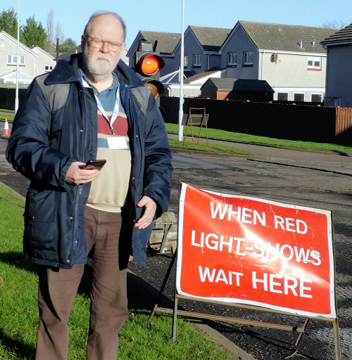 Cllr Dempsey at the site of the recent road repairs on Moray Way, Dalgety Bay